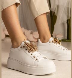 Снимка на UR/CEO White sneakers adorned with a rhinestone butterfly Kariba