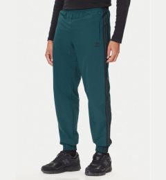 Снимка на adidas Долнище анцуг adicolor Woven Firebird JY1335 Зелен Regular Fit