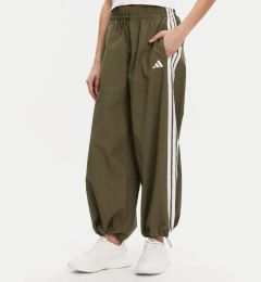Снимка на adidas Долнище анцуг Essentials 3-Stripes JE1308 Зелен Loose Fit