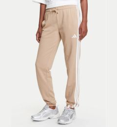 Снимка на adidas Долнище анцуг Essentials 3-Stripes JX7661 Бежов Regular Fit