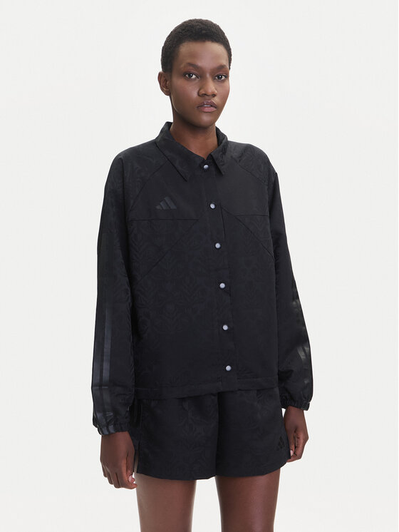 Снимка на adidas Преходно яке Tiro x Common Goal Coaches JL7647 Черен Loose Fit