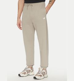 Снимка на New Balance Долнище анцуг Essentials MP41519 Бежов Relaxed Fit